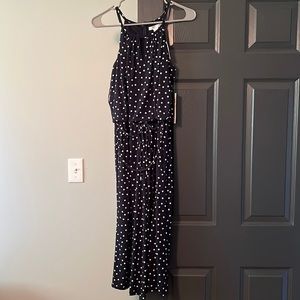 Romper brand new. Navy blue Polka dot